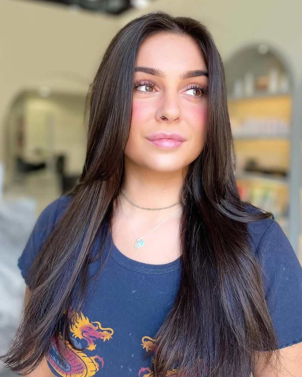 Long dark hair, smoothed and styled at Tara Rose