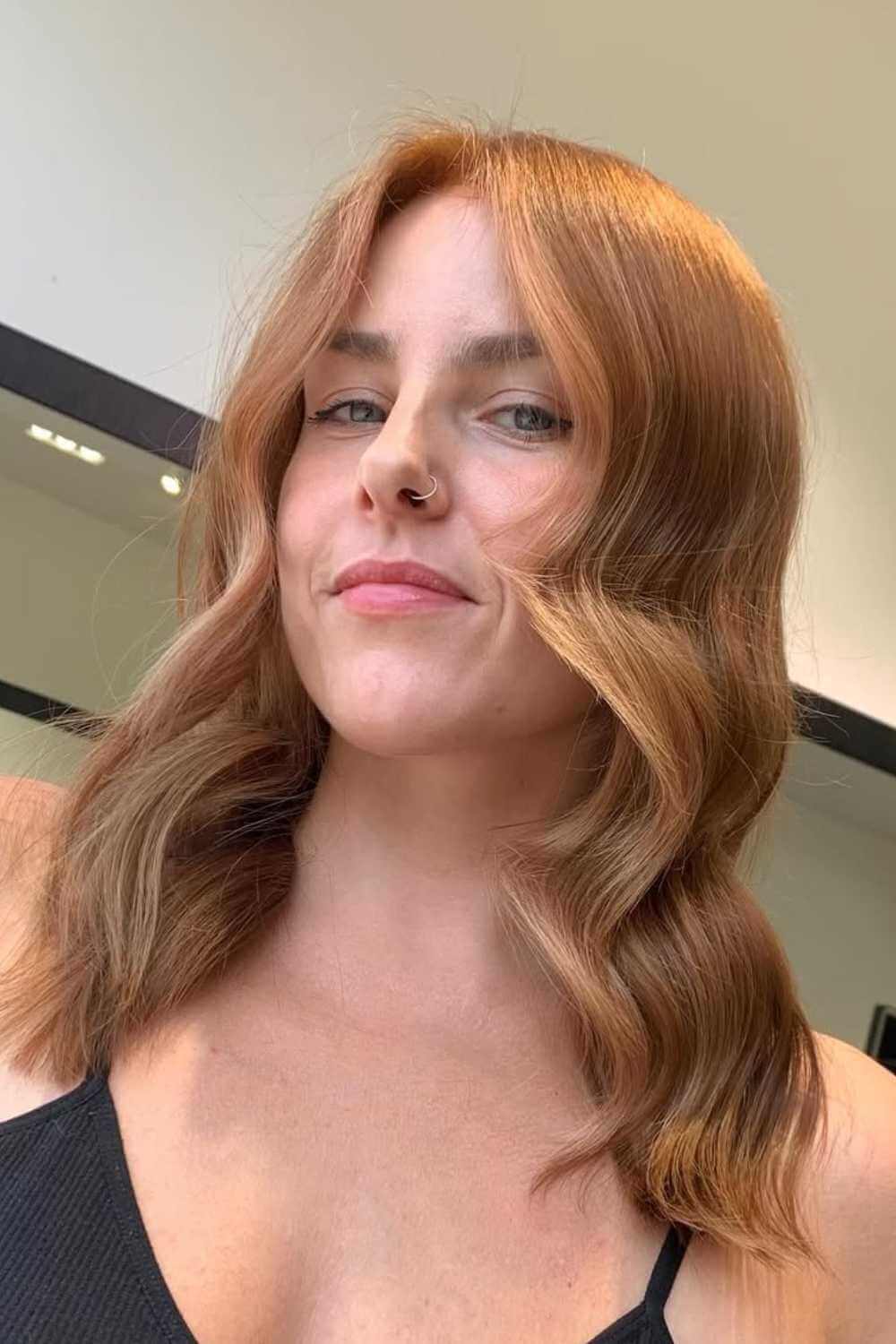 Warm copper hair colour with soft waves