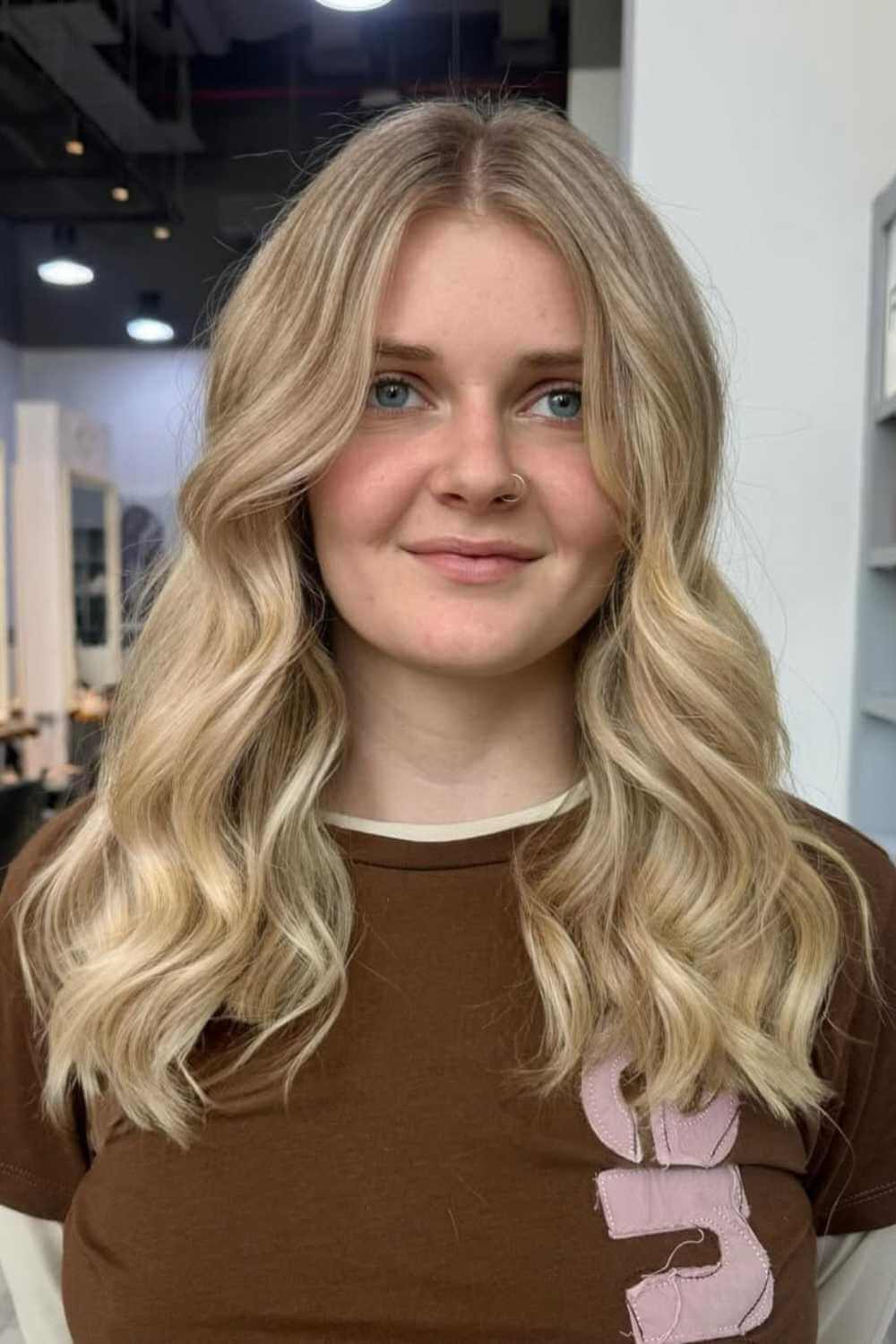 Blonde hair with soft curls