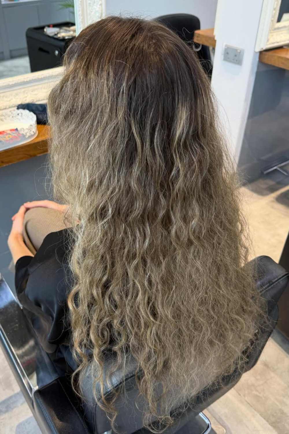 Long balayage waves blended through the lengths