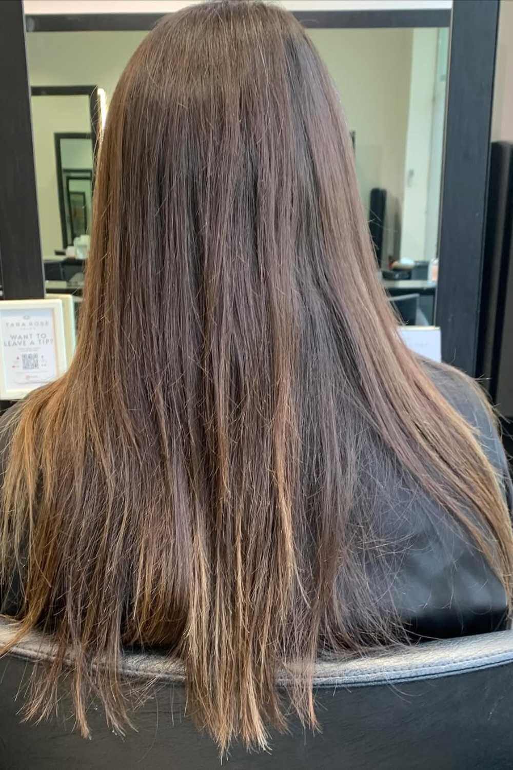 Long bronde hair, smoothed and straightened