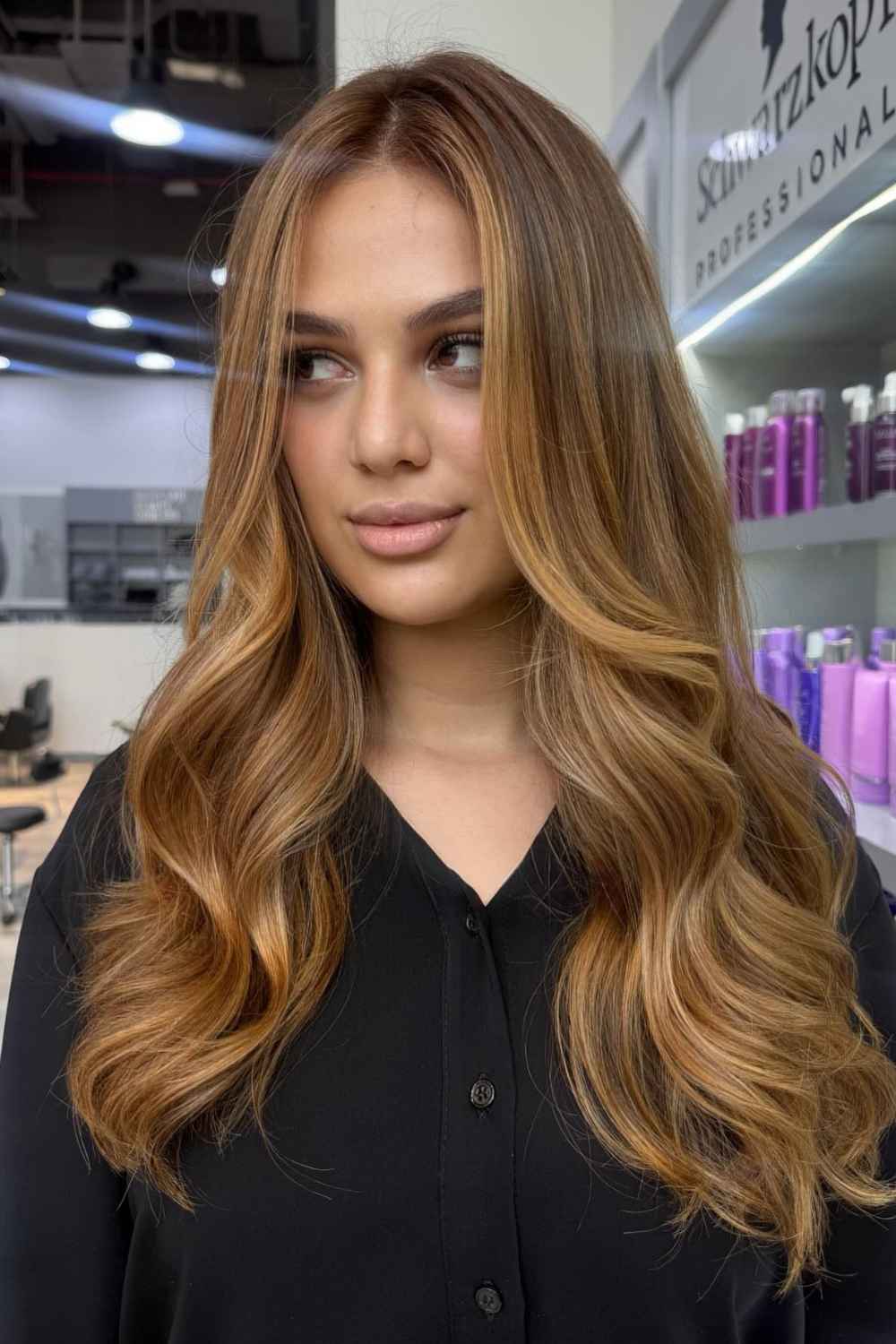 Caramel bronde colour through long waves